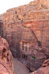 Al Khazneh. It is the treasury in Petra ancient city. Petra is the main attraction of Jordan. Petra is included in the UNESCO heritage list.