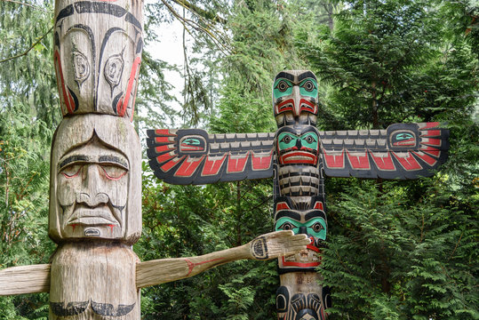Close up detail of traditional totem poles, located in British Columbia
