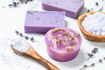 Lavender soap bars on white top view.
