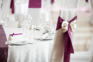 Crystal glasses arranged on a table. Background texture.