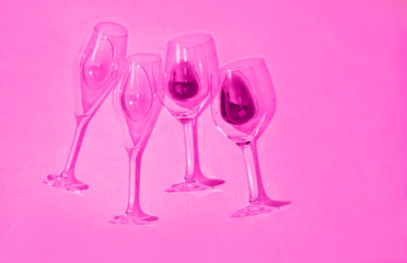 Glasses of wine and champagne. The pink colour. Bright fuchsia.