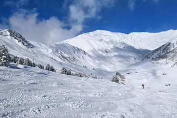 Fototapeta na wymiar Winter mountains and ski slope in Zillertal Valley in Tyrol.