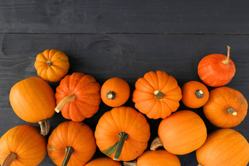 Orange pumpkins autumn food background.