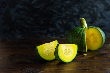 Still Life of Pumpkin on dark background and black wall