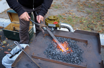 Blacksmith, hammer, smithy, forceps, forge, glowing, red, iron, burning, fire, metal, anvil, hand,...