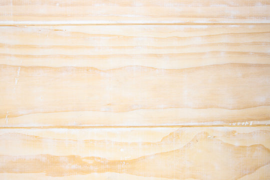 White toned wooden board top view photo. White wood texture. Rustic timber table top view. Polished wood backdrop