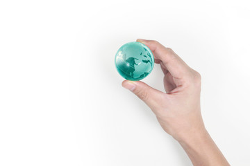 Globe ,earth in  hand, holding our planet glowing. Earth image provided by Nasa