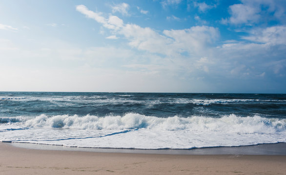 View of beach and clouds