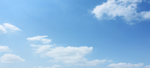 Naklejka na ściany i meble Empty white cloud on blue sky