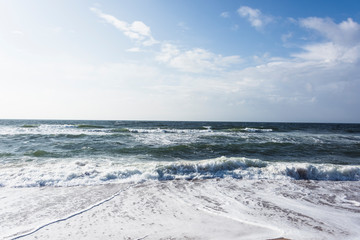 View of beach and clouds