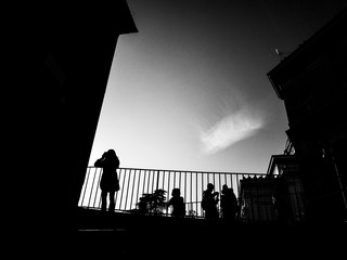 Silhouette of people on the balcony 10
