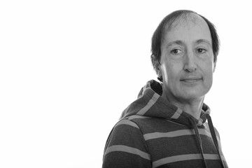 Portrait studio shot of mature man in black and white