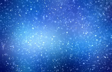 Magical winter holiday night. Snowfall on deep blue gleaming background. Christmas design. Blur soft texture.