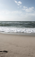 View of beach and clouds