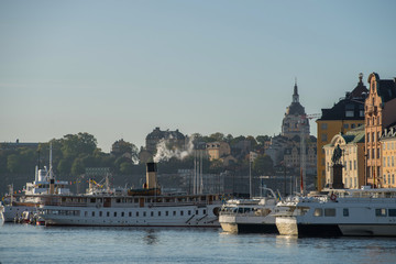 Morning view over Stockholm inner harbour with boats, piers and islands an autumn day. 