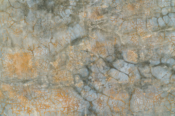 Rusty cracked smooth concrete wall texture background. Rust orange grunge concrete wall surface
