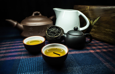 Close up Chinese tea ceremony with clay teapots
