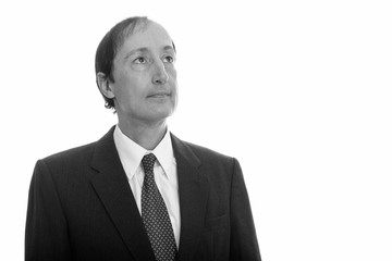 Portrait studio shot of mature man in black and white