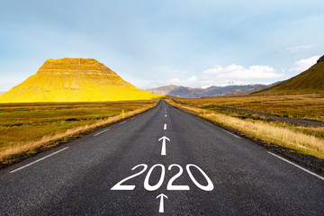 Number 2020 on an empty road, New Year concept.