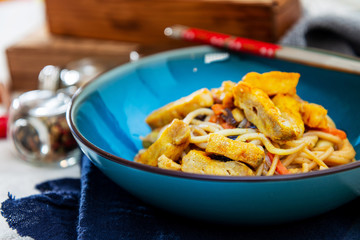 wok chicken with soy sauce noodles and vegetables