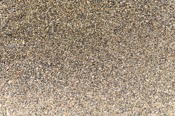 background of colored pebbles and sand