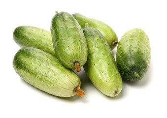 Green cucumber on the white background