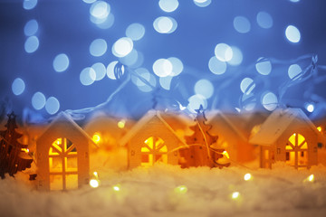 Fototapeta na wymiar Glowing houses Christmas card