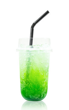 Kiwi fruit italian soda drink in glass with straws.