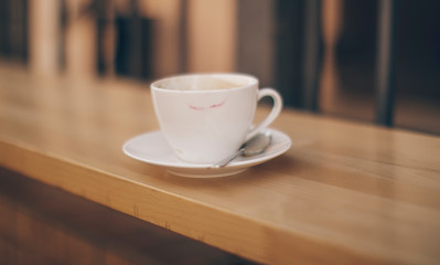 cup of coffee on wooden table