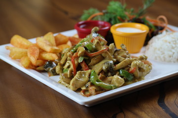 Chicken with Vegetables and French Fries