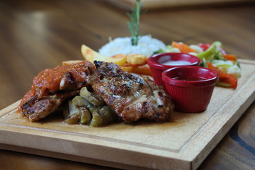 Chicken and french fries with rice