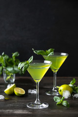 Gimlet cocktail with fresh basil leaves
