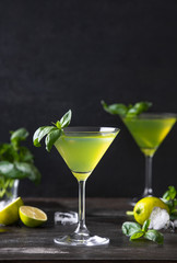 Gimlet cocktail with fresh basil leaves