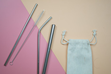 Metal tubes for cocktails and small linen fabric bag