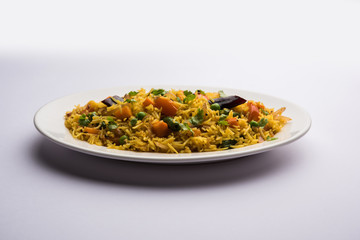 Tawa Pulao/Pulav/Pilaf/Pilau is an Indian Street Food  made using basmati rice, vegetables and spices. Selective focus