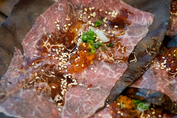 Japanese beef Wagyu grill on dry leaf.