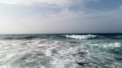 landscape and sunset on the Atlantic coast watching the breaking of the waves