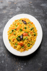 Tawa Pulao/Pulav/Pilaf/Pilau is an Indian Street Food  made using basmati rice, vegetables and spices. Selective focus