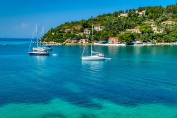 Yachts in Lakka harbour on the island of Paxos in Greece
