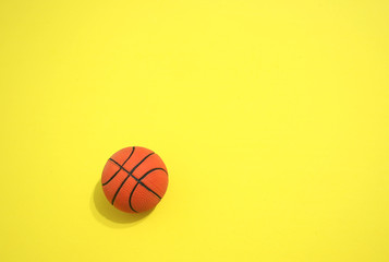 BASKET BALL OVER YELLOW