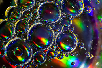 Full color rainbow bubbles abstract art water oil background