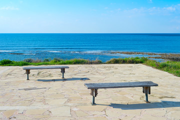 Obraz premium Empty benches sea Paphos, Cyprus