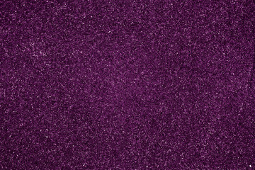 Abstract purple shiny background. Dark pink textile texture. Sparkly  fabric backdrop. Material, paper design.