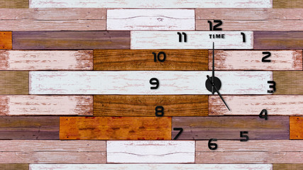 Clock on wooden background