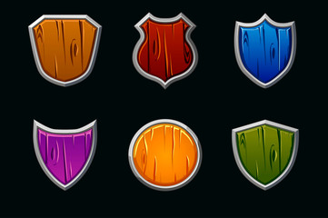 Vector wooden shields in different shape and colors. Empty template medieval shield. Objects on separate layers.