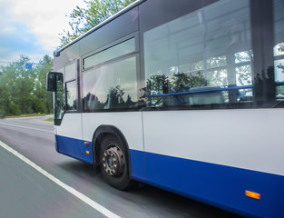bus moves along the road