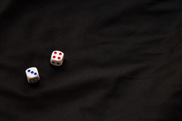 dice on the black table