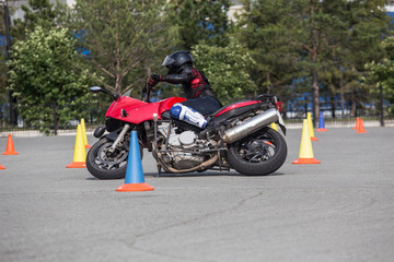 Motorcyclist on a motorcycle at a figure driving