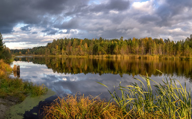 panorama of autumn landscape with forest lake, Russia, Ural