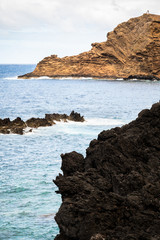 Fototapeta na wymiar Rocky blue ocean in Madeira - Madeira, Portugal